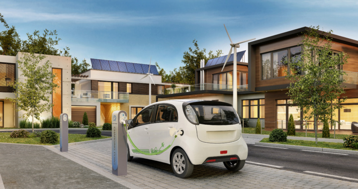 Modern houses with solar panels and electric car